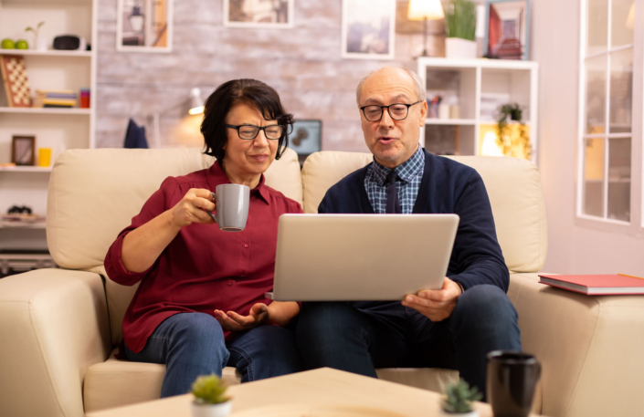 Older_Couple_Using_Modern_Laptop_original_410469
